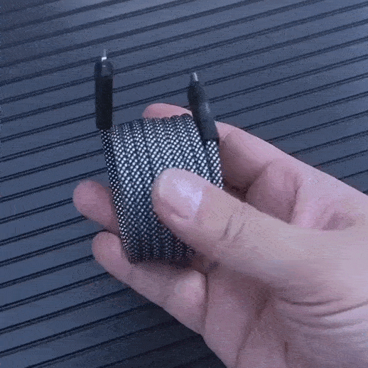 Holding a USB C cable made for Apple products